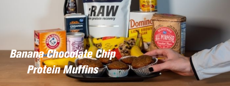 Required Ingredients for Banana Chocolate Chip Protein Muffins behind completed muffins, text "Banana Chocolate Chip Protein Muffins"